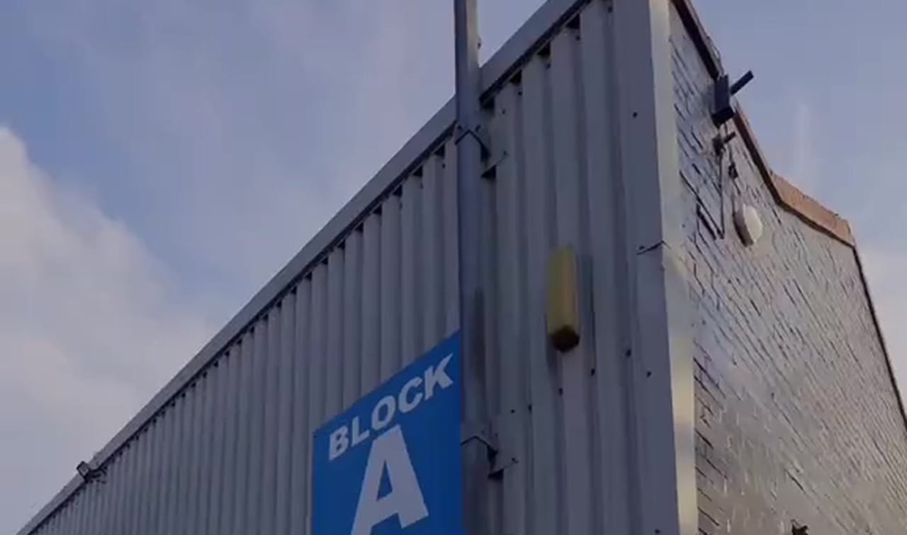 The blue BLOCK A sign mounted on the corner of the unit at Chartwell Business Park